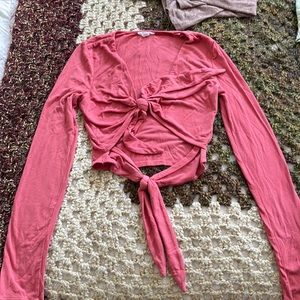 Pink long sleeve cut out shirt